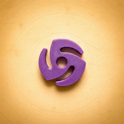 Purple 3D-printed 45 RPM vinyl adapter on a retro vintage background